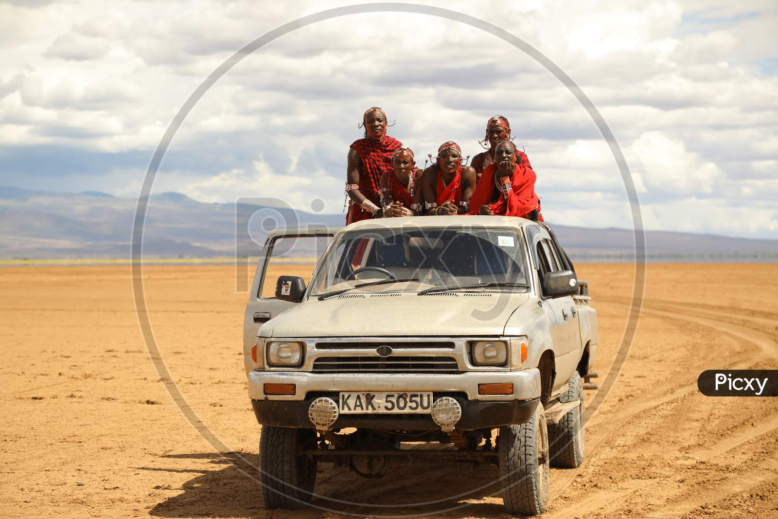 Kenya people traveling in a Car