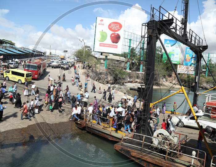 Passengers getting down the ferry ship in Kenya