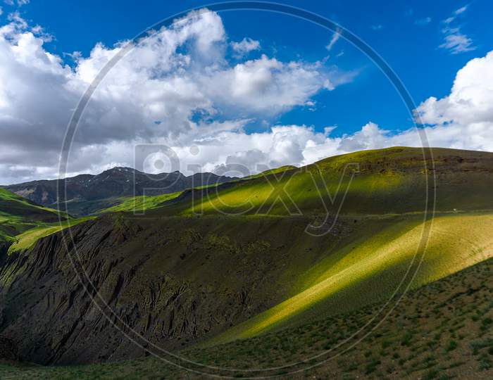 Landscape Of Green Pastures  With Cloudy Sky  At Leh