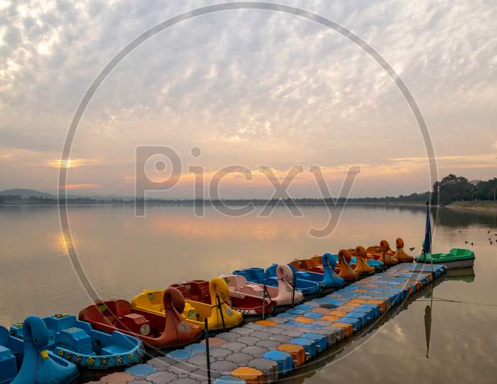 Boats in a row in the sukhna lake chandigarh