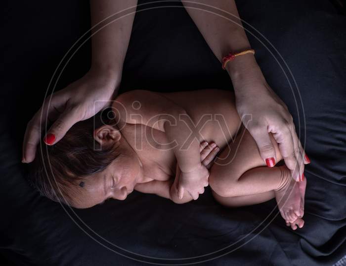 Cute Baby Girl Sleeping With Mother Hands Caring