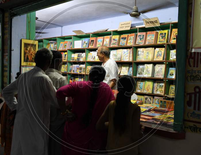 Pilgrims Buying Books From Stalls in Rishikesh