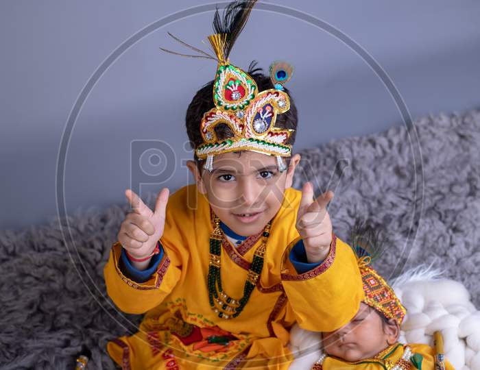 Adorable Indian Boy Dressed as Lord Sri krishna And Posing