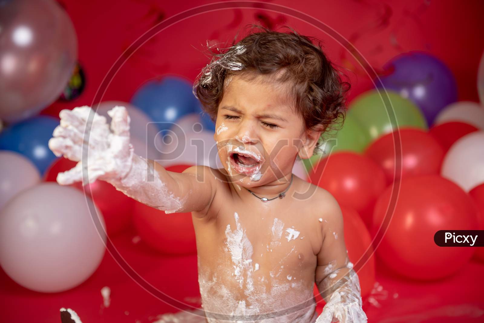 Image Of Cake Breaking Ceremony On Baby Turning 1 Year Birthday 