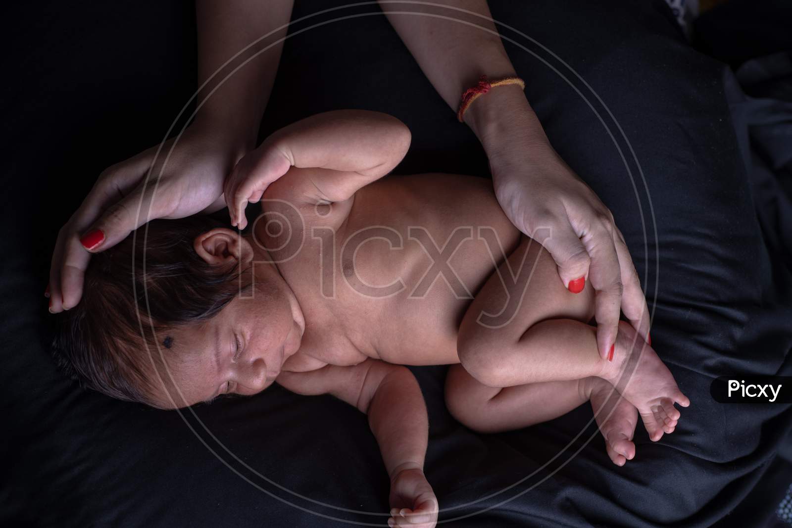 Cute Baby Girl Sleeping With Mother Hands Caring