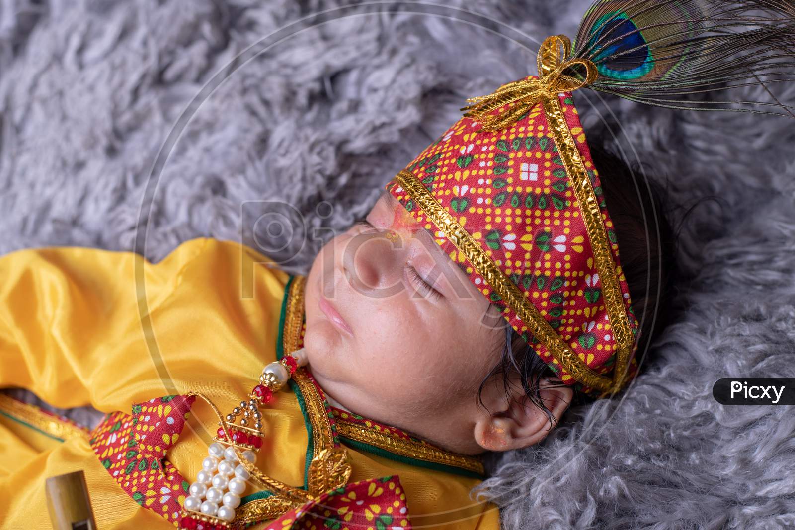 Cute Little Baby In Lord Sri Krishna Clothes  Sleeping Calmly