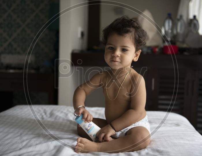 Cute Baby Girl Playing in a House