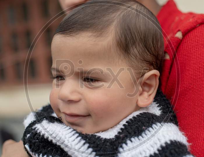 Cute Little Girl Child  With Smile Face Closeup With Innocent Expression