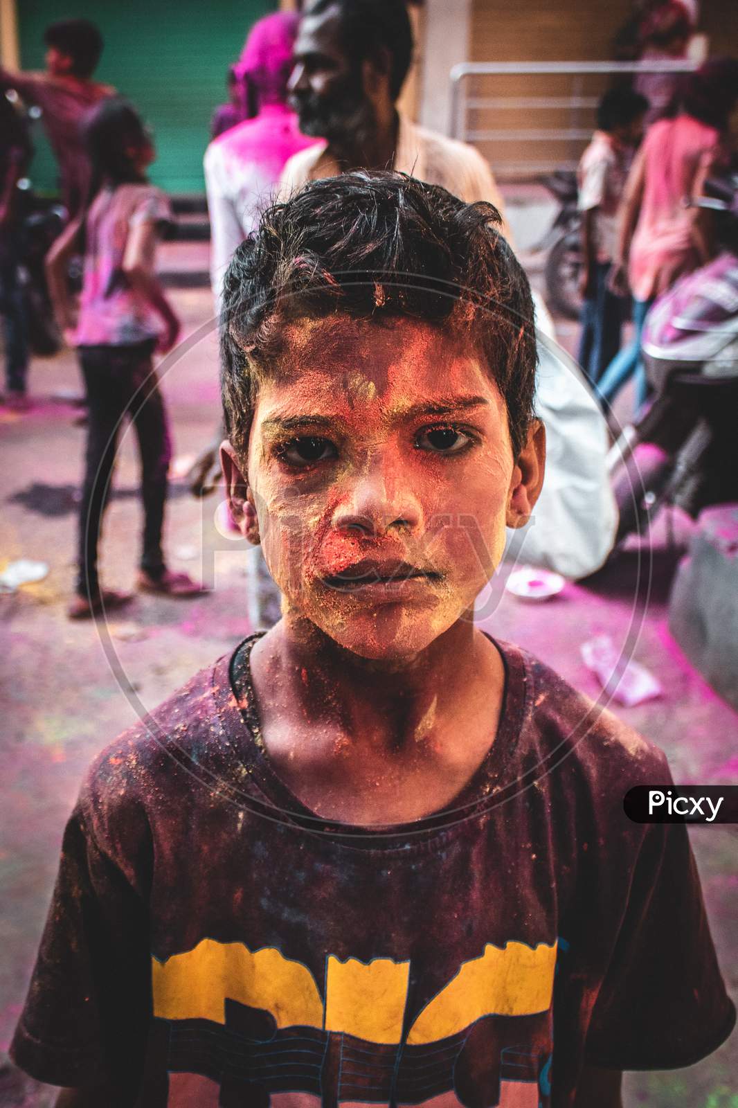 boy with colours on his face