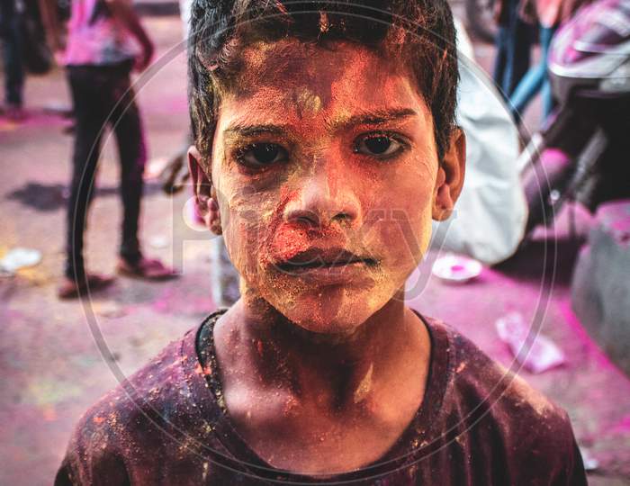 boy with colours on his face