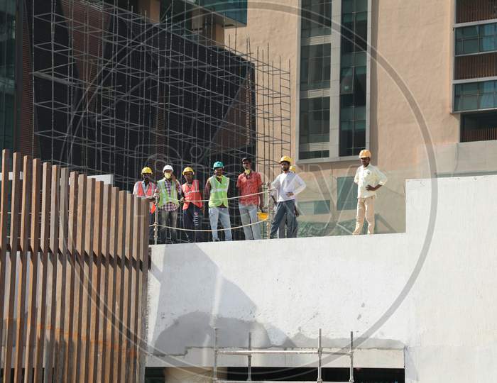 Construction Workers At a Construction Site