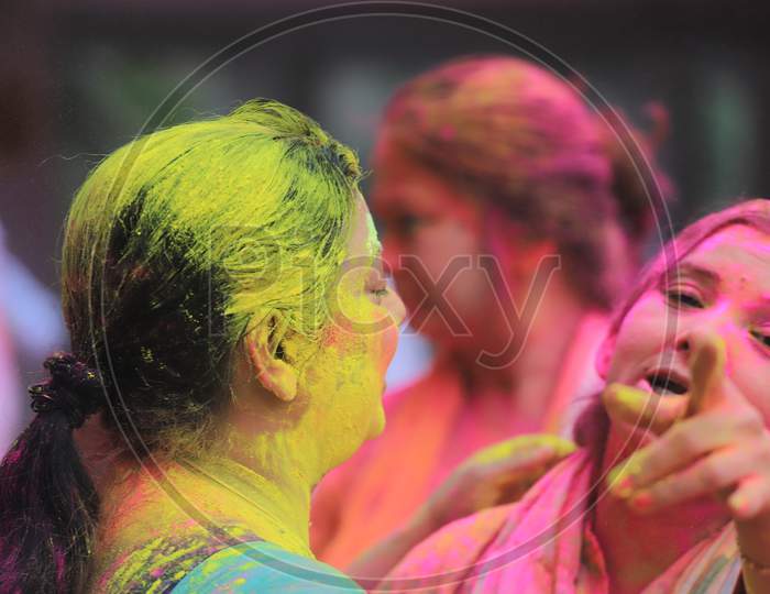 Crowd Of Young Indians  Celebrating Holi With Colour Splash  During Holi Festival