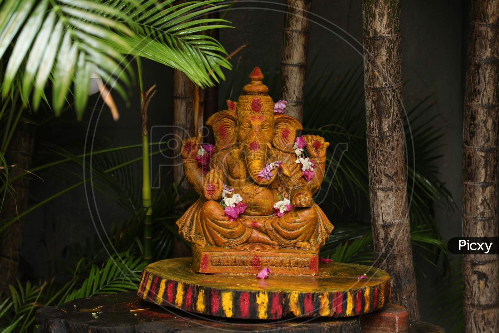 Lord Ganesh Statue In an House Lawn Garden