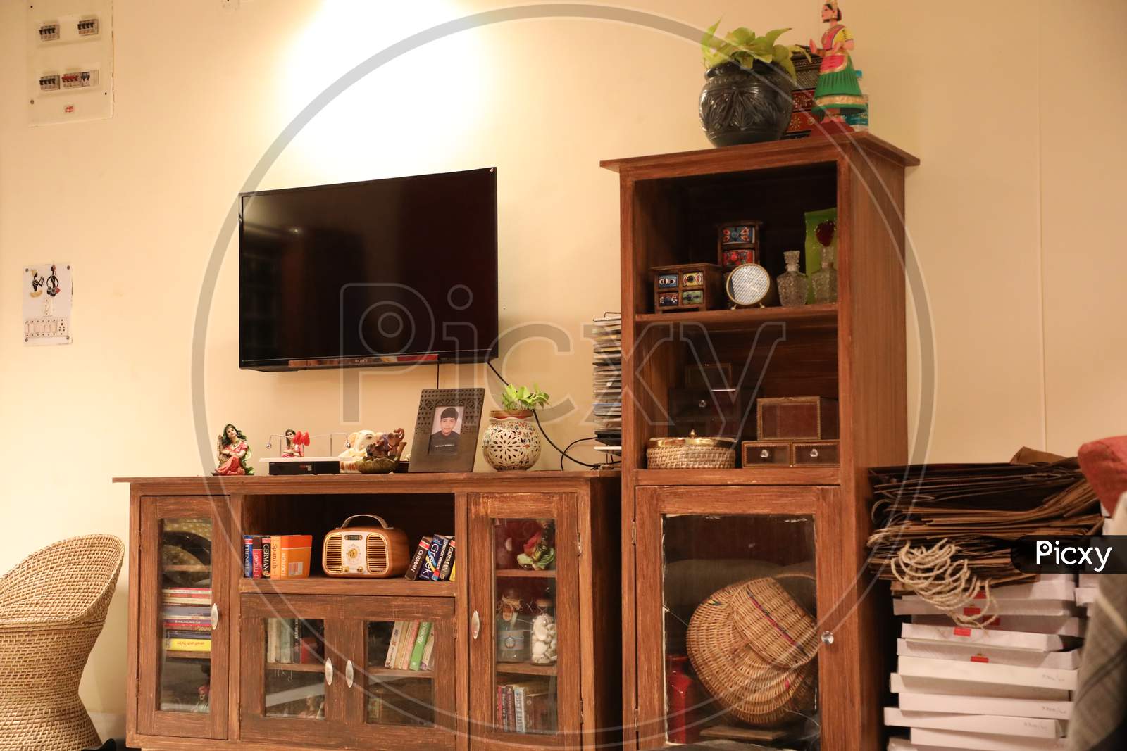 Interior Of a House With TV And Wooden Cupboard