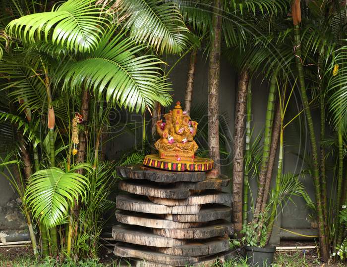 Hindu God Lord Ganesh Idol In an House Lawn Garden