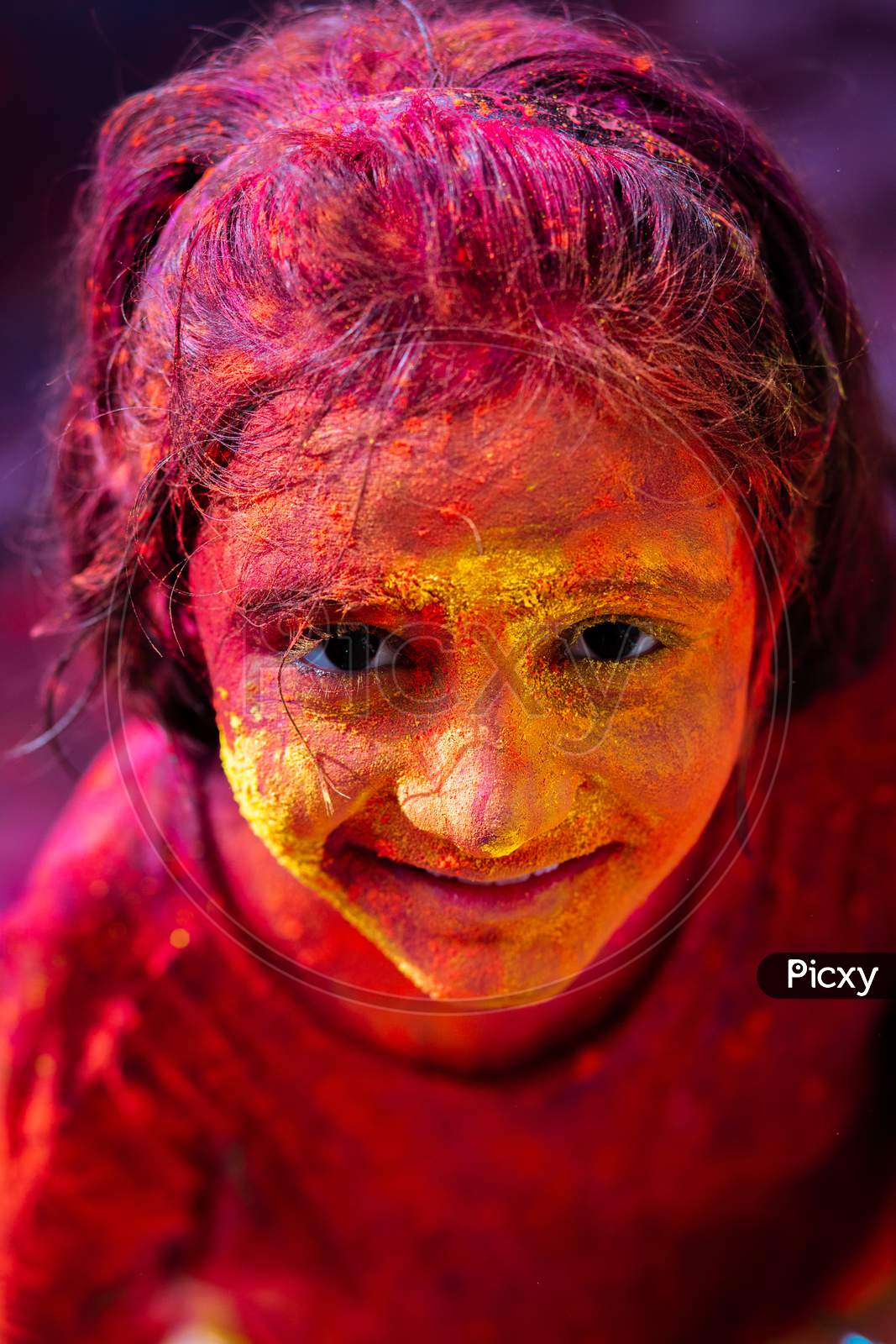 Indian  Young Girl Filled in Holi Colours