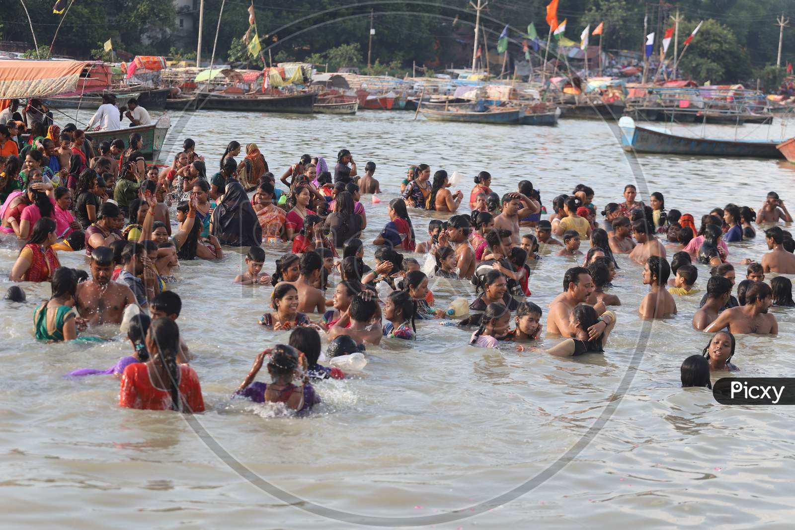 Hindu Devotees Or Pilgrims Taking Holy Bath In Triveni Sangam River At Prayagraj