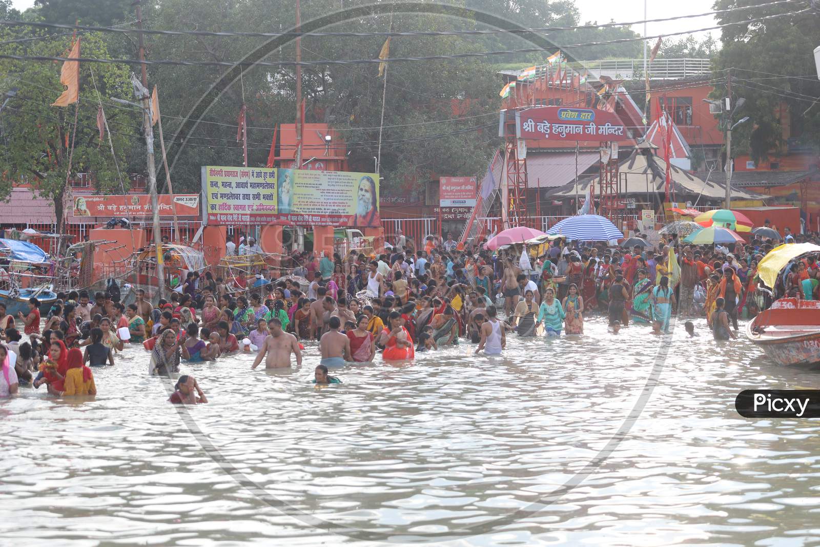 Hindu Devotees Taking Holy Bath In Triveni Sangam River At Prayagraj