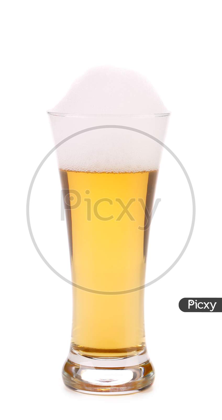 Full Glass Of Beer With Foam. Isolated On A White Background.
