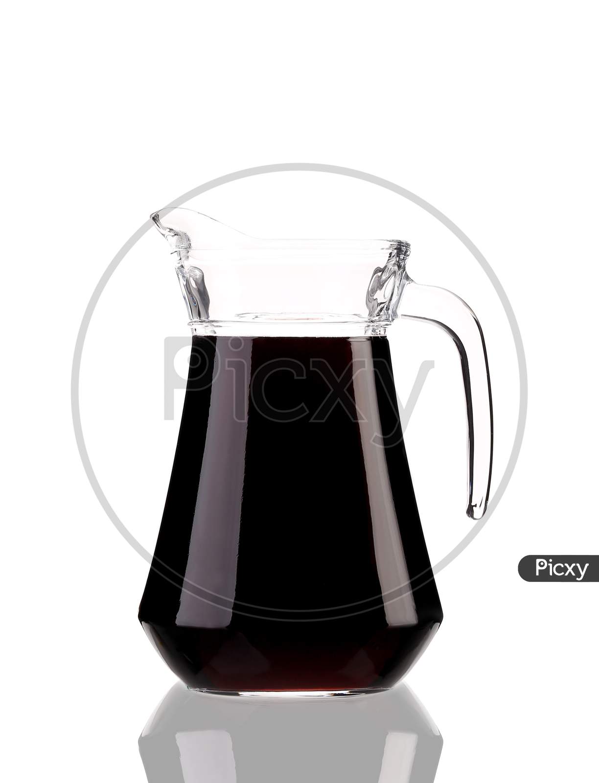 Pitcher Of Red Wine With Reflection. Isolated On A White Background.