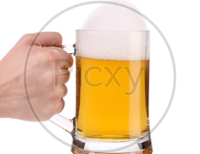 Hand Holding Mug Of Fresh Beer With Foam. Isolated On A White Background.