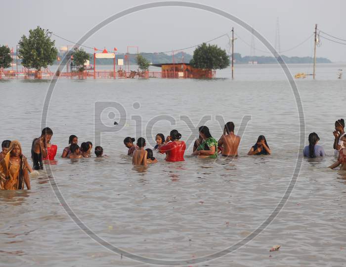 Hindu Devotees Taking Bath In Holy River Triveni Sangam At Prayagraj