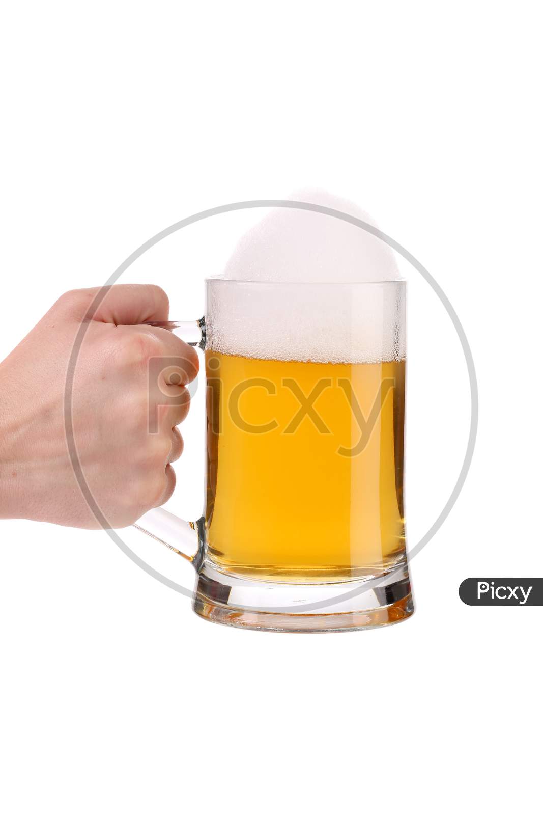 Hand Holding Mug Of Fresh Beer With Foam. Isolated On A White Background.