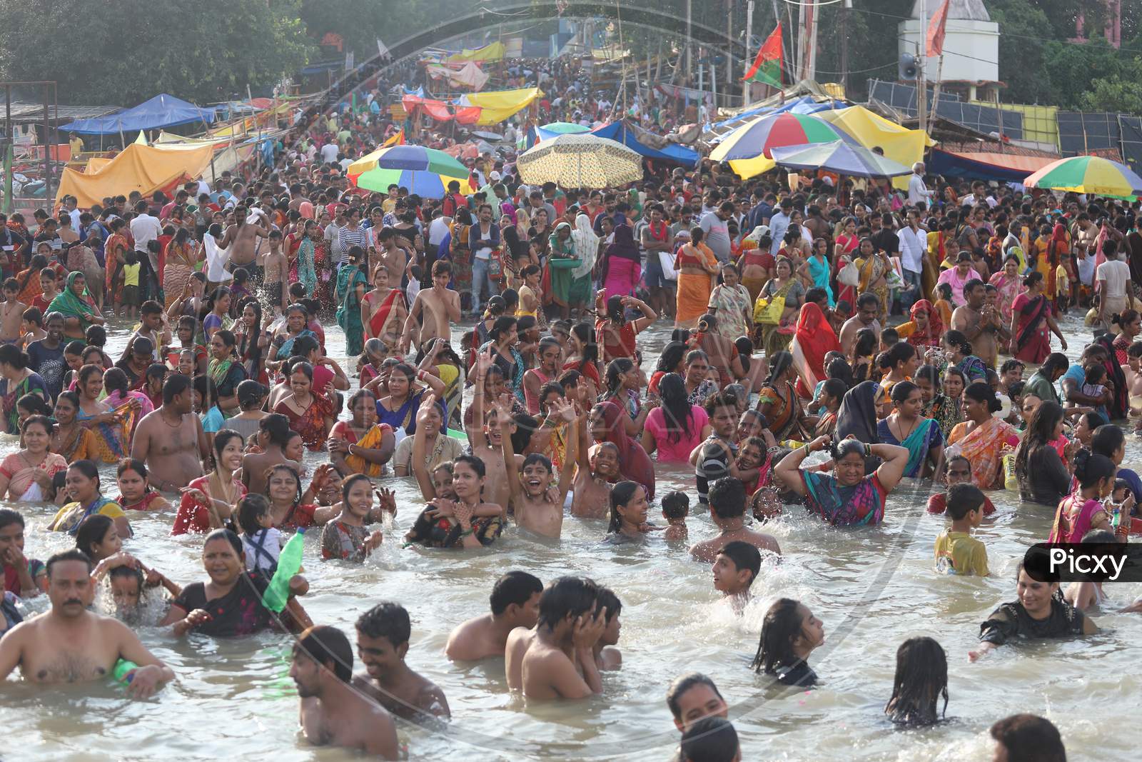 Hindu Devotees Or Pilgrims Taking Holy Bath In Triveni Sangam River At Prayagraj