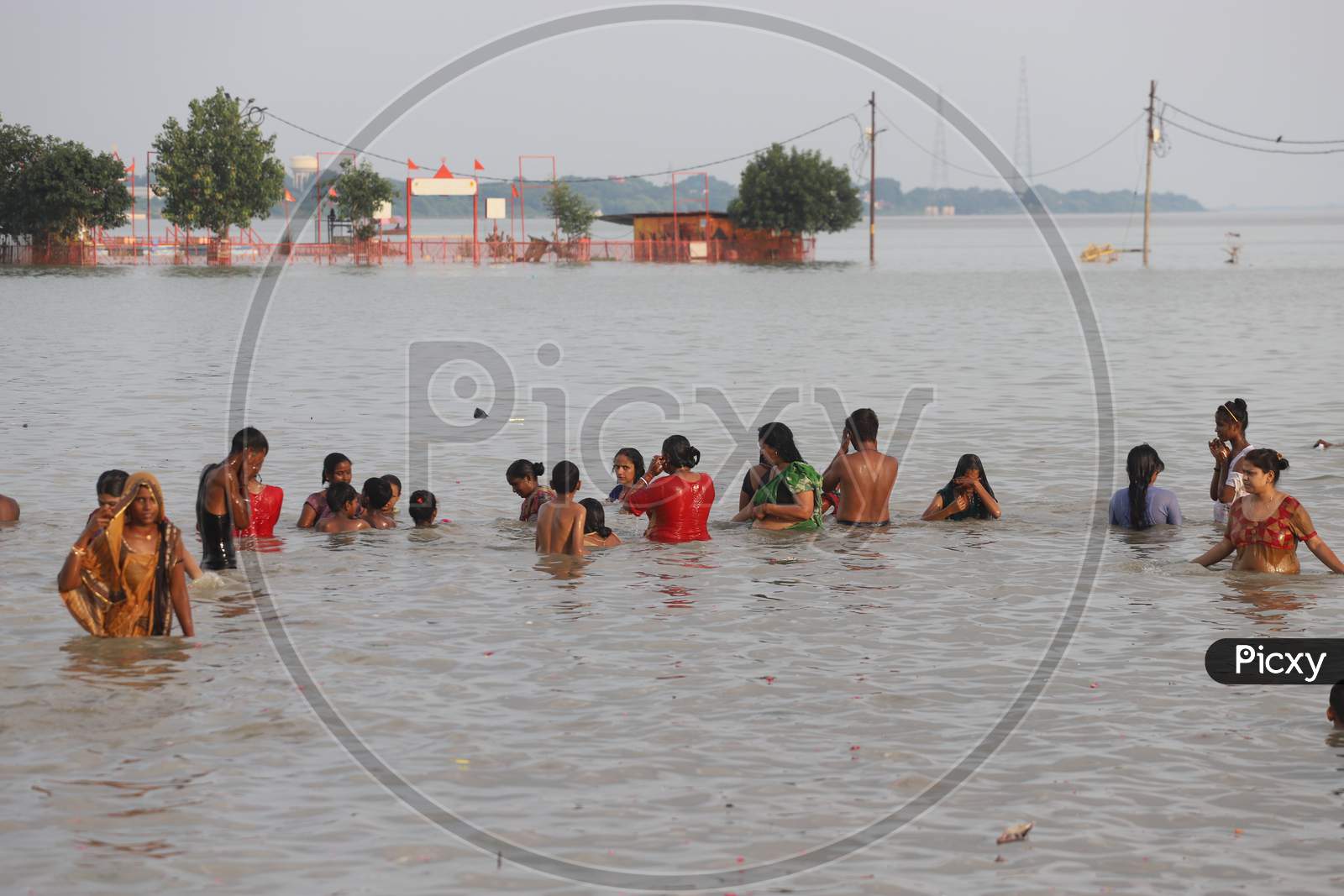 Hindu Devotees Taking Bath In Holy River Triveni Sangam At Prayagraj