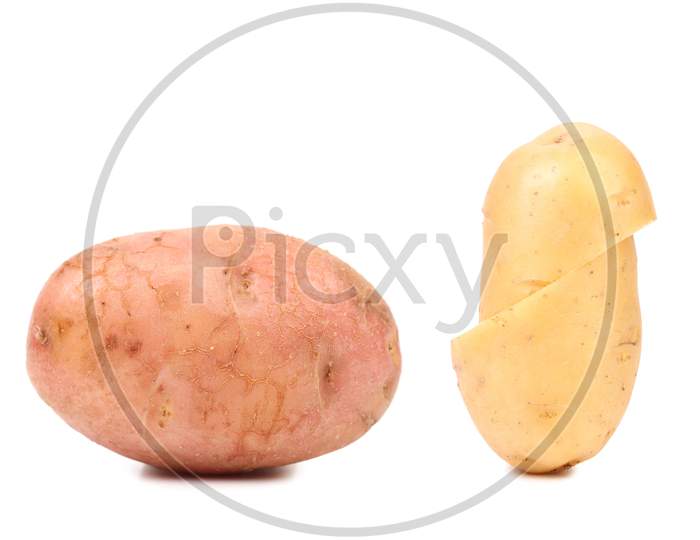 Two Potatoe Whole And Cut. Red And White