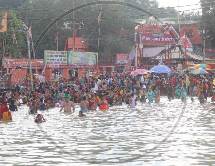 Hindu Devotees Taking Holy Bath In Triveni Sangam River At Prayagraj