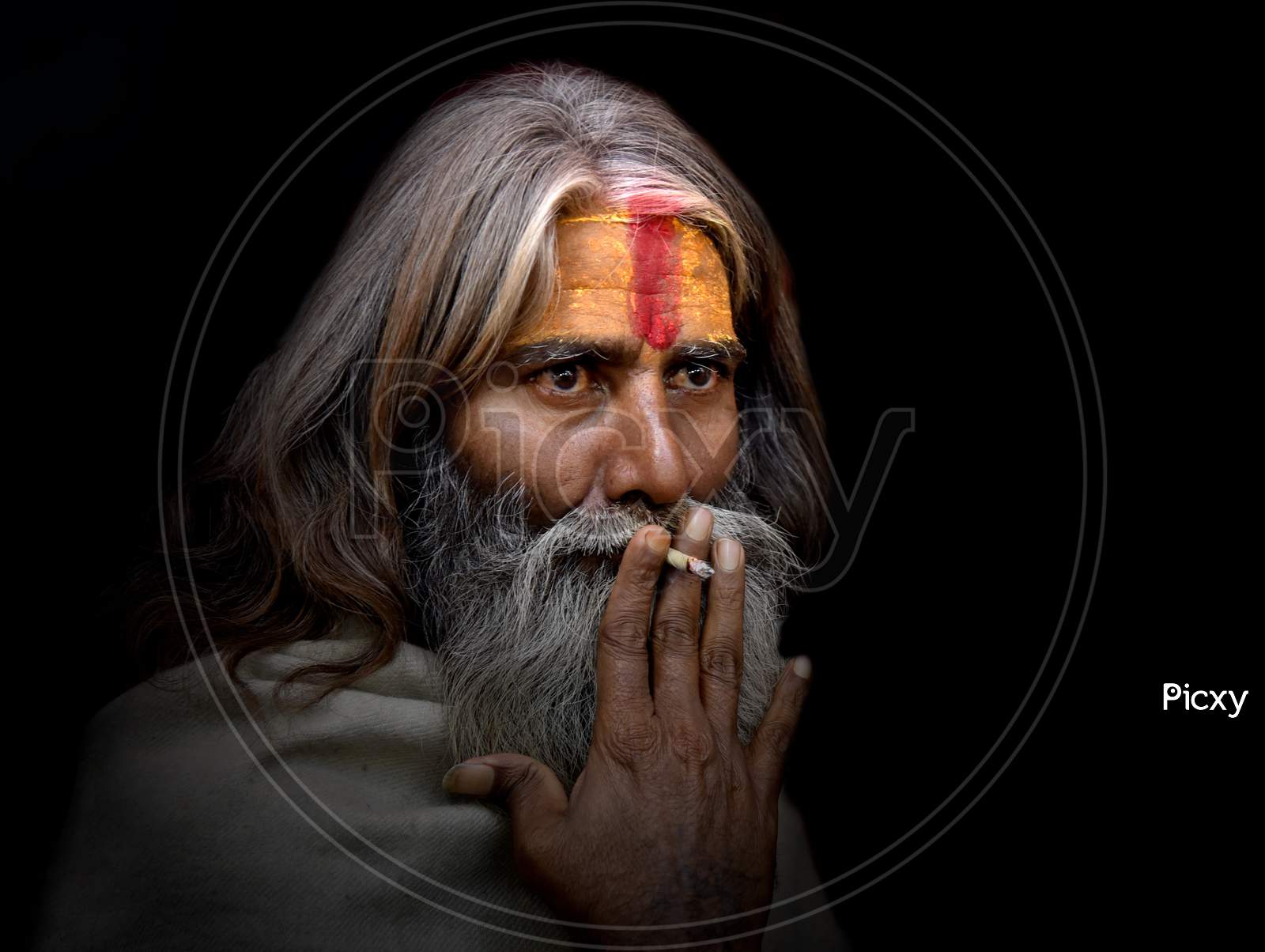 Portrait Of An Hindu Baba Or Sadhu  Smoking Beedi