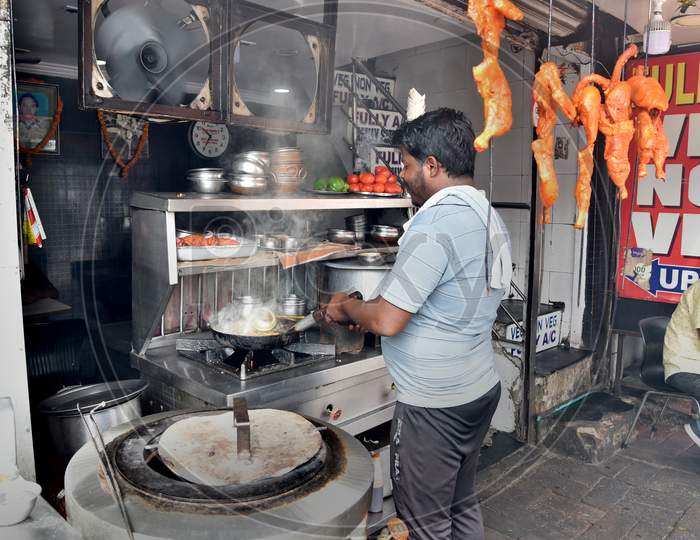 Indian Street Food Vendors Selling Authentic Indian Food At Vendor Stalls on indian streets