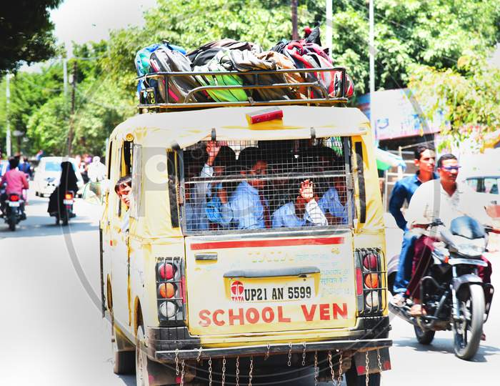 School Children Going To School in an School Van in India