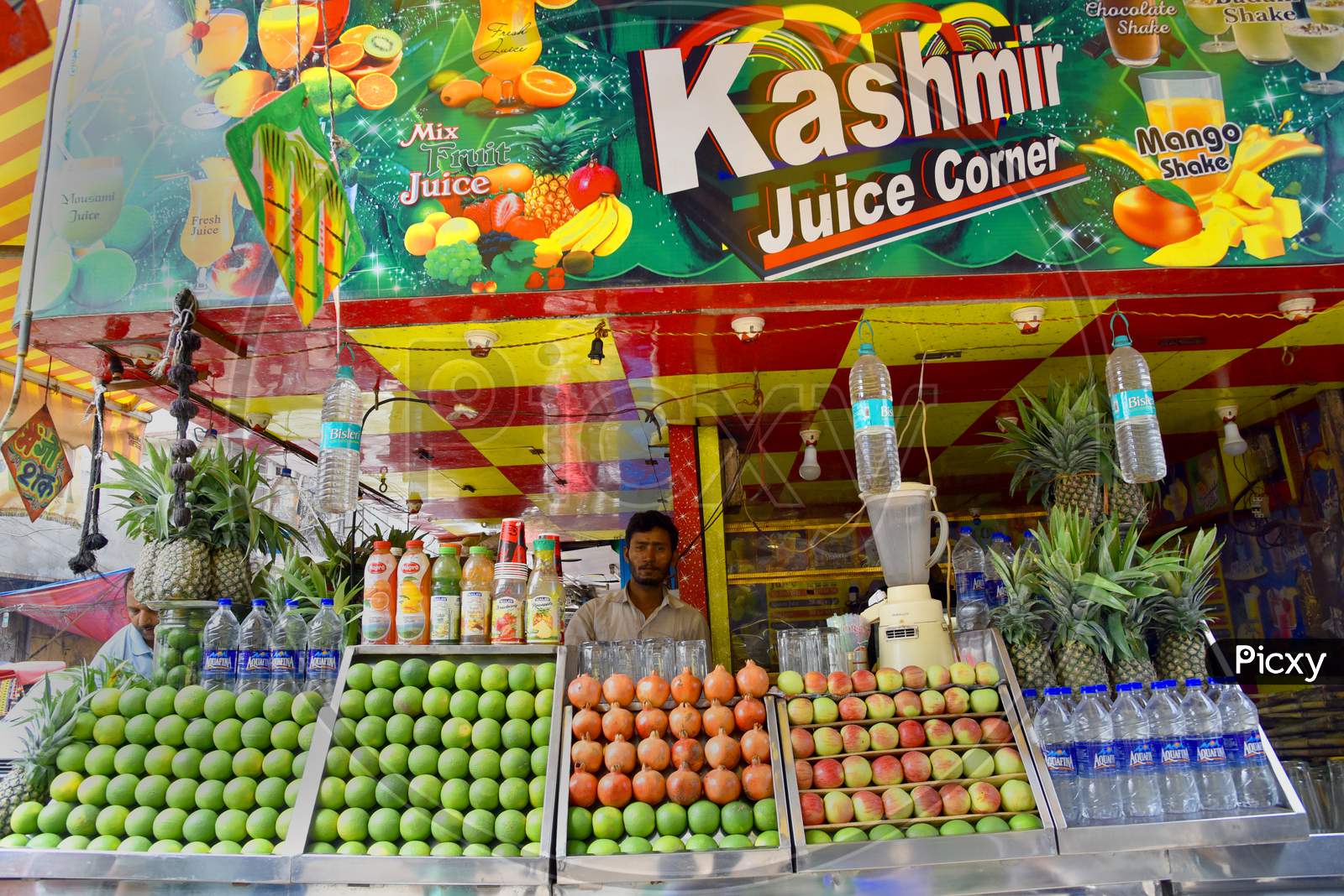 Fresh Fruit Juice Center With Fresh Fruits In Display
