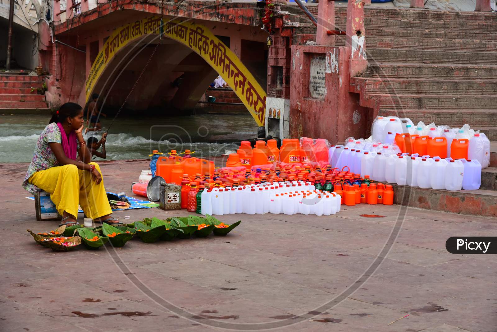 Vendors Selling Holy River Ganga Water In Bottles At Bramha Kund , Haridwar