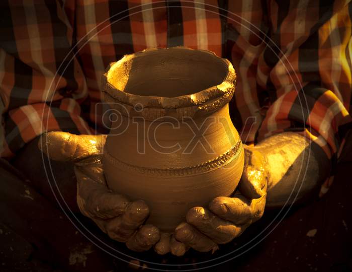 Unglazed pottery, the oldest form of pottery practiced in India, terracotta clay-pot making