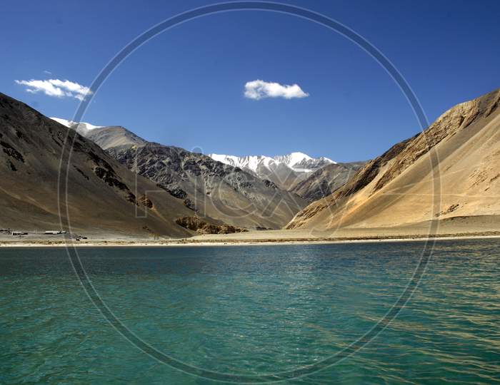 Beautiful View Of Pangong Lake With Snow Filled Mountains In Leh