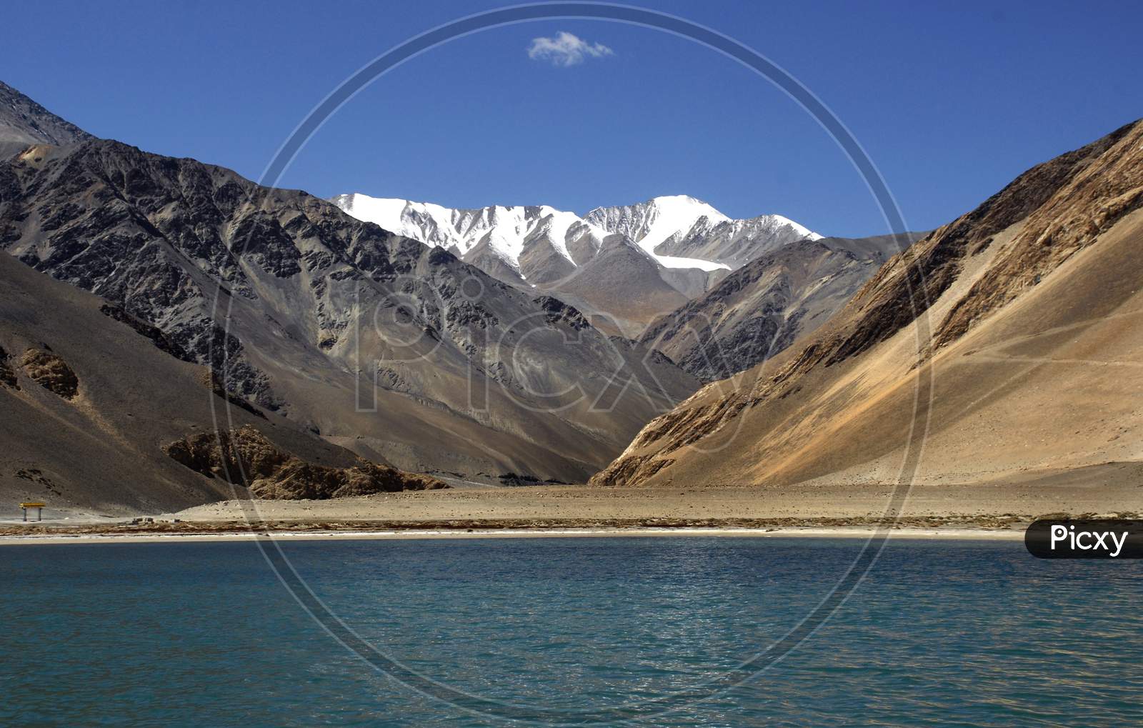 A View Of Snow Capped Mountains And Pangong Lake  In Leh