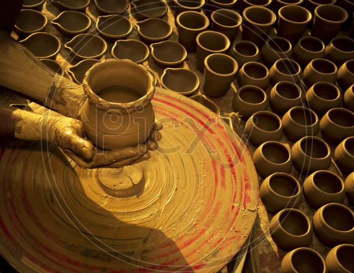Unglazed pottery, the oldest form of pottery practiced in India, terracotta clay-pot making