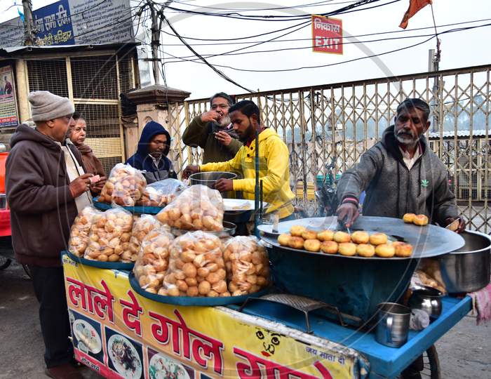 Street Food Vendor Making Cutlet At a Panipuri Stall