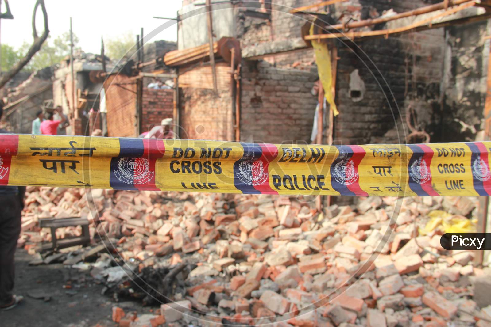 Delhi Police Ribbon Or Barricades  At  Gokulpuri Tyre Market After Mob Set Them On Fire  During Violence Against Citizenship Amend Law in North East Delhi