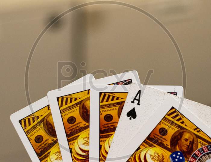 Ace of spades placed among the other playing cards