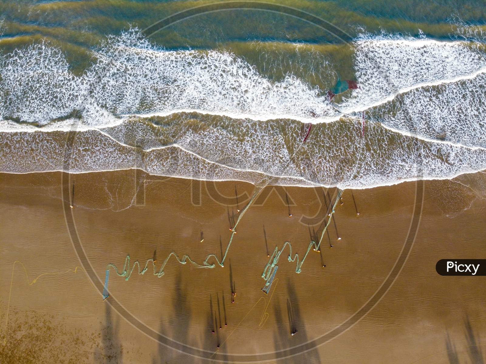 Aerial view of Fishing Net in the beach by fisherman in kudle beach