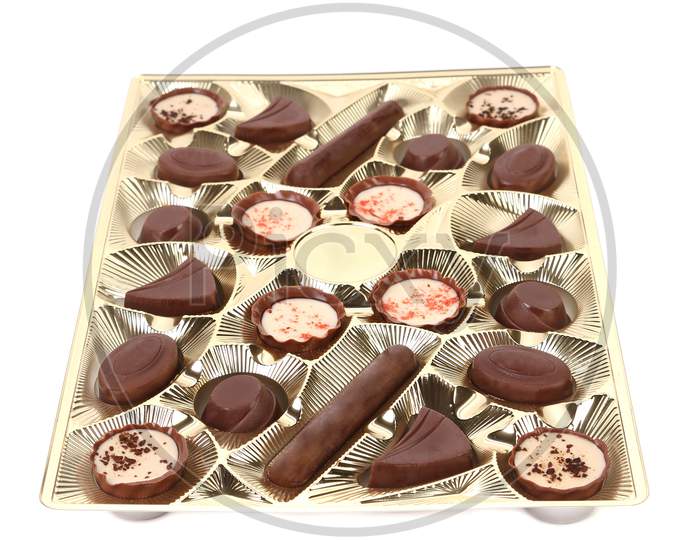 Box With Chocolate Candy. Isolated On A White Background.