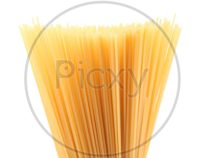 Bunch Of Uncooked Spaghetti. Close Up. Isolated On A White Background.