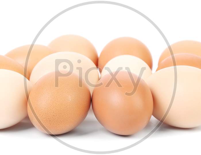 Brown And White Eggs. Isolated On A White Background.
