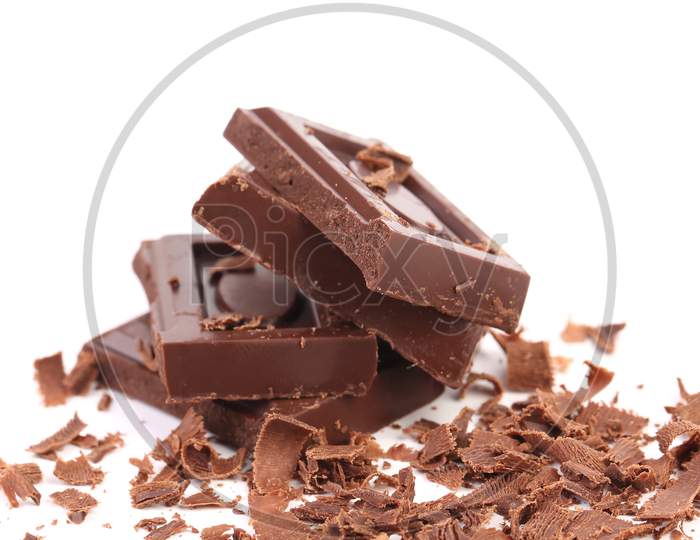 Chocolate Bars And Shaving. Isolated On A White Background.