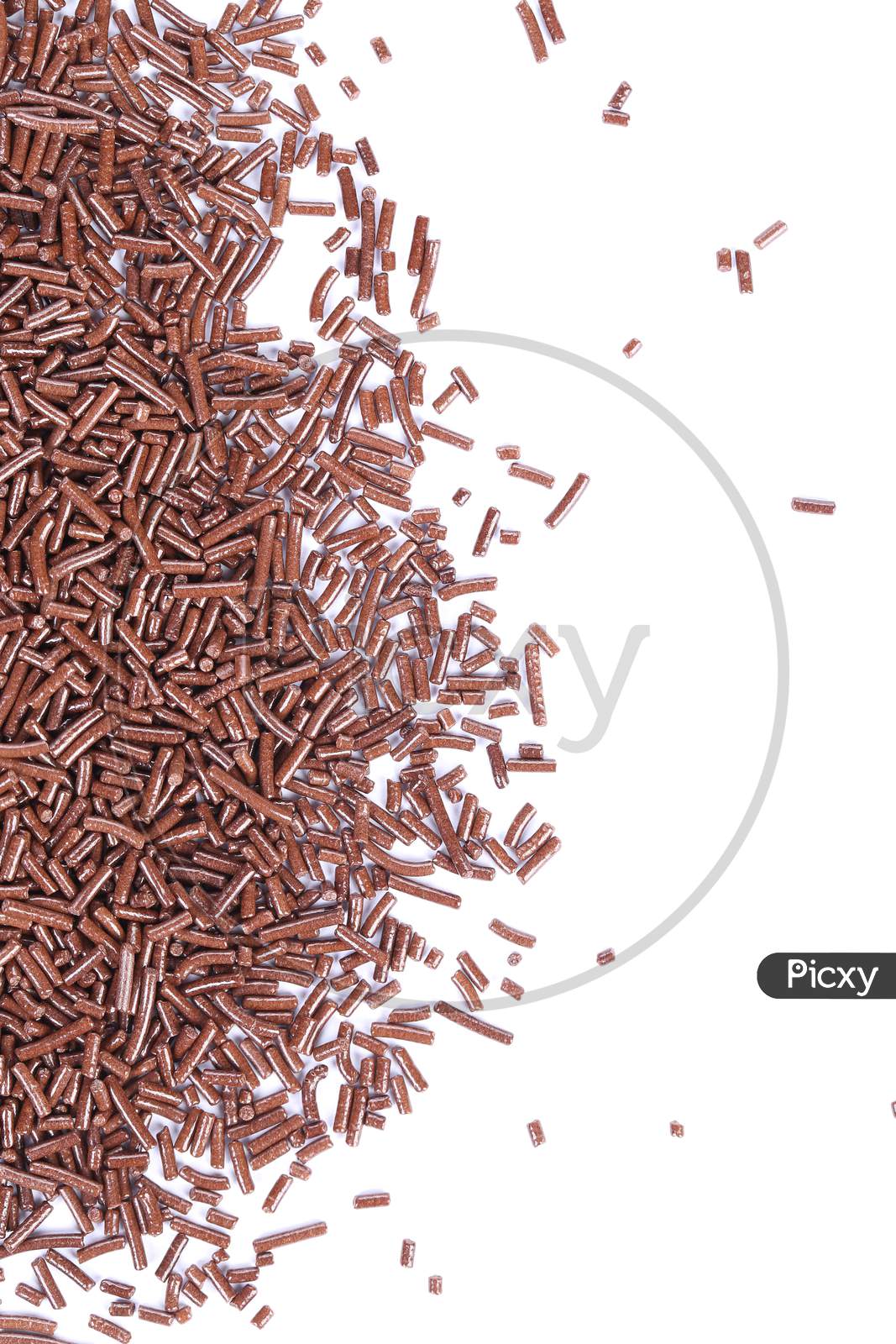 Close Up Of Chocolate Sprinkles. Vertical. Whole Background.