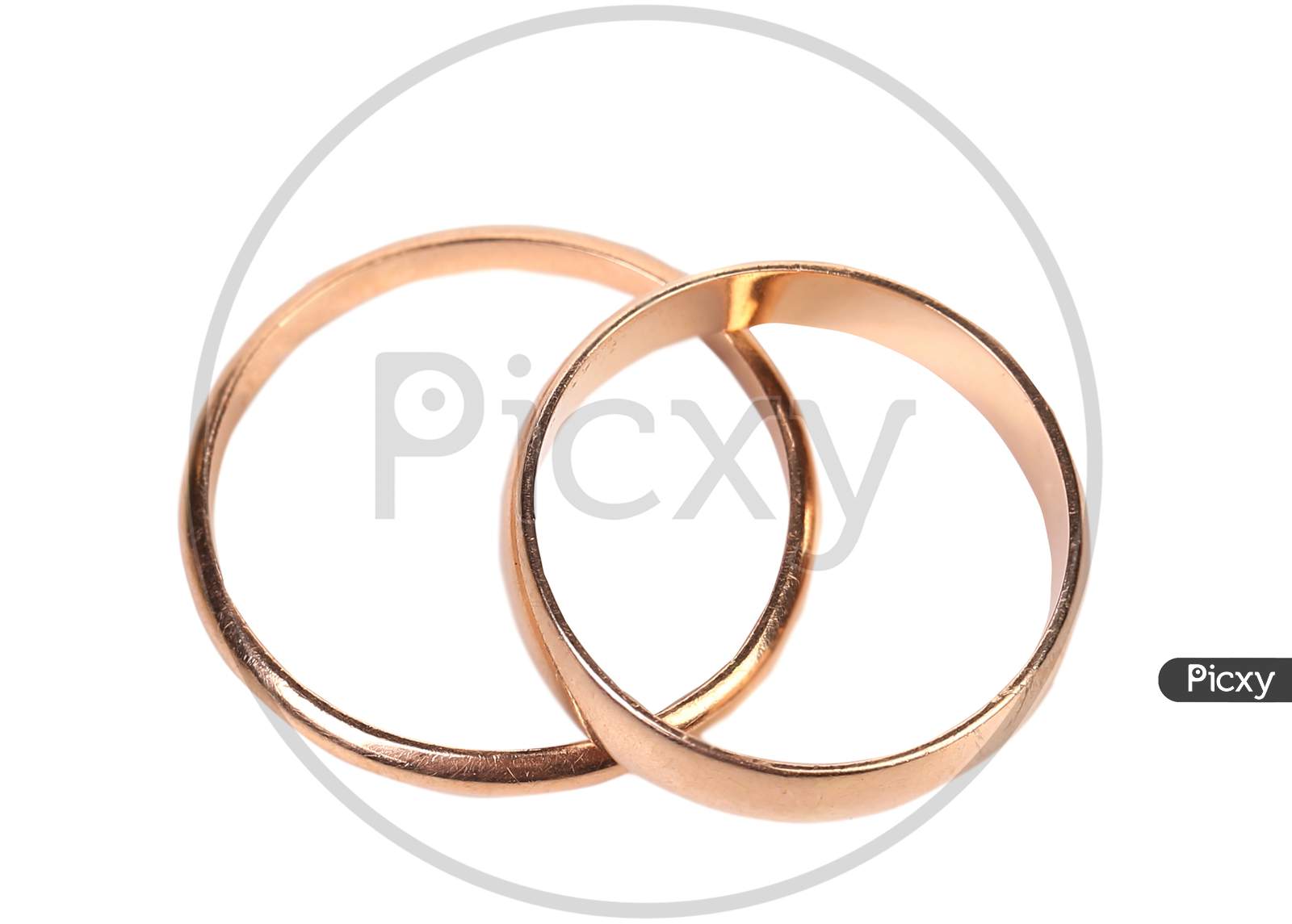 Top View Of Wedding Rings. Isolated On A White Background.